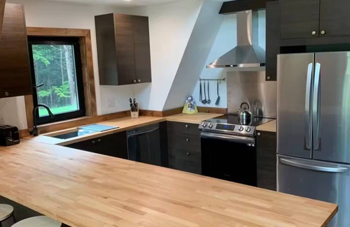 Danbury Ski Chalet | Cozy 2-bedroom A Frame chalet in delightful Danbury NH with WiFi and AC
