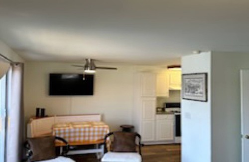 Ticonderoga House | Cozy 2 bedroom cabin at Lake George water's edge with deck & beautiful sunsets.