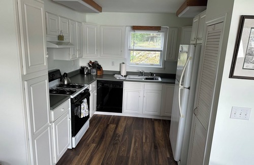 Ticonderoga House | Cozy 2 bedroom cabin at Lake George water's edge with deck & beautiful sunsets.