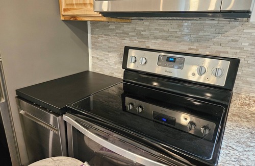 Rapid City Cabin | Cozy 2-bedroom cabin on Rapid River right down the road from Torch Lake