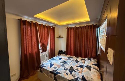 Santolan Apartment | Cozy 2-bedroom Condo at Marcos Highway