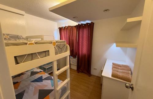 Santolan Apartment | Cozy 2-bedroom Condo at Marcos Highway