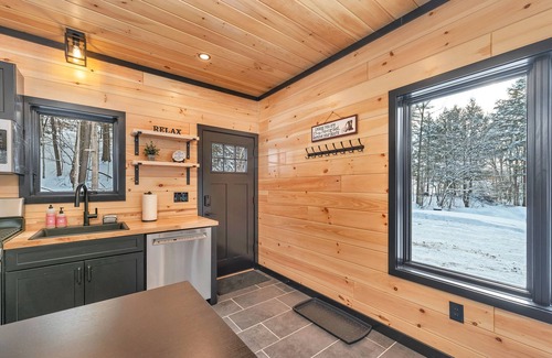Norwich House | Cozy 2BR/1BA cabin for 6. Fireplace, outdoor fire pit, hot tub, and soaking tub.