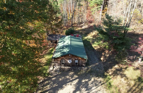 Butler Cabin | Cozy 2BR/2BA cabin tucked in the trees with hot tub, fire pit, covered deck, and fast WiFi.