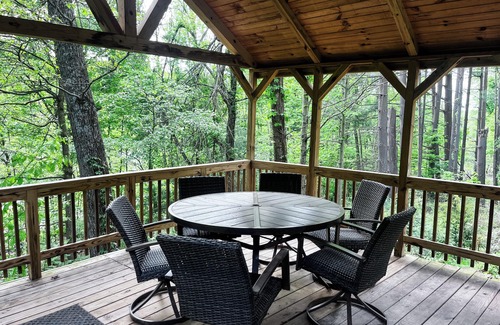 Butler Cabin | Cozy 2BR/2BA cabin tucked in the trees with hot tub, fire pit, covered deck, and fast WiFi.