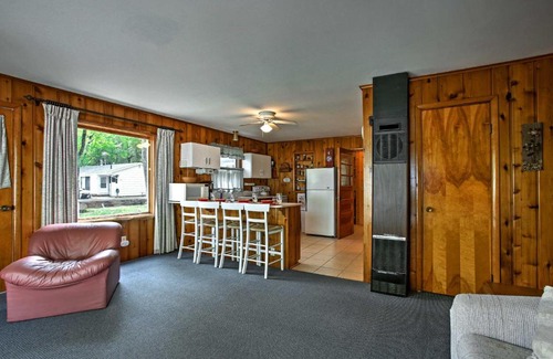 Burt Lake House | Cozy Alanson Cottage - Steps to Dock on Burt Lake!
