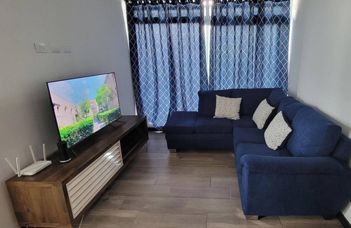 Zona 12 Apartment | Cozy apartment, your family will be close to everything. City & volcanoes views.