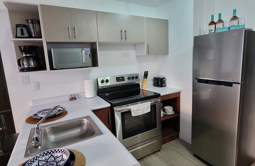 Zona 12 Apartment | Cozy apartment, your family will be close to everything. City & volcanoes views.