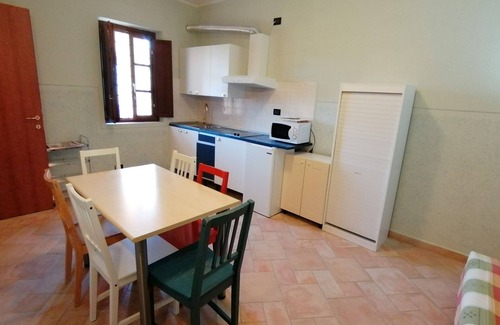 Mulazzo Apartment | Cozy apartment in small hamlet, with pool and views of the Apuan Alps