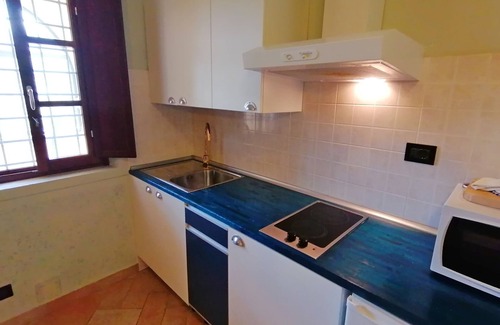 Mulazzo Apartment | Cozy apartment in small hamlet, with pool and views of the Apuan Alps
