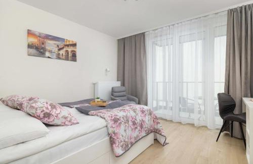 Grzegorzki Apartment | Cozy Apartments Łaszkiewicza with Parking by Noclegi Renters