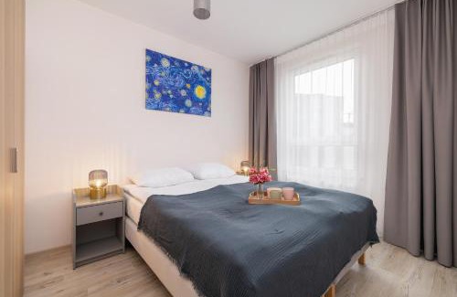 Grzegorzki Apartment | Cozy Apartments Łaszkiewicza with Parking by Noclegi Renters