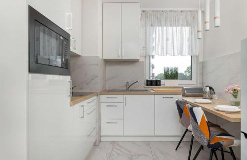 Grzegorzki Apartment | Cozy Apartments Łaszkiewicza with Parking by Noclegi Renters