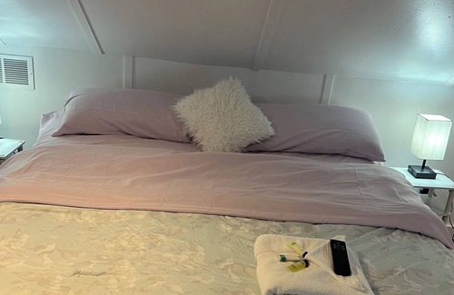 Halfway Apartment | Cozy Attic! With adjustable office space and ergonomic king size bed.