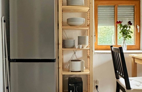 Furstenfeldbruck District House | Cozy Bavarian home with fireplace and fully equipped kitchen.