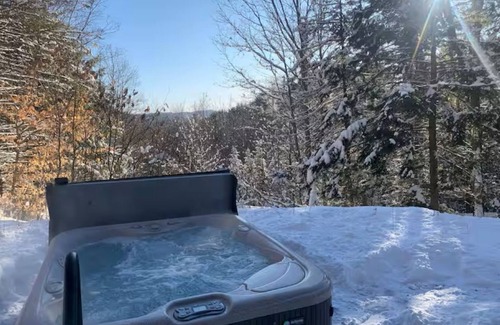 West Fairlee House | Cozy Bow House Perched in Trees w/Hot Tub & View
