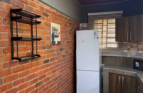 Pepease Apartment | Cozy Bricks Apartment