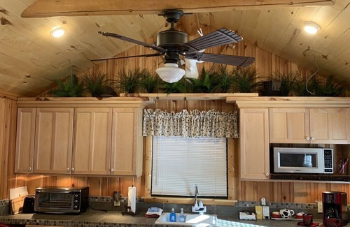 Woodruff Cottage | Cozy cabin gas fire place heated floors perfect for snowmobiling on trail 51