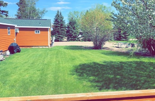 Napoleon Cabin | Cozy cabin. Sleeps 2-4. Includes kitchenette, Wi-Fi and an outdoor space.
