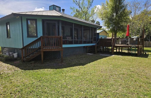 Astor House | Cozy canal front house with its own boat ramp and dock. Amazing waterfront view.