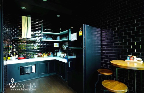 Lak Si Hotel | Cozy Capsule Dorms With a Shared Kitchen and a Social Area