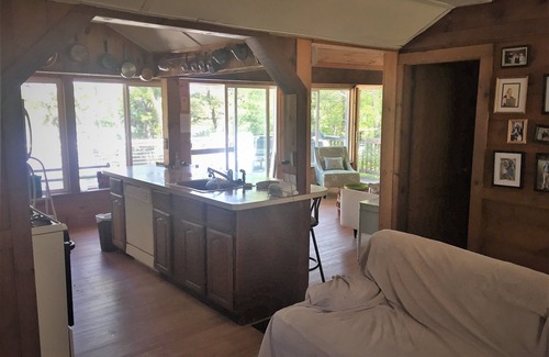 East Falmouth Cottage | Cozy Cape Cod cottage overlooking Jenkins Pond; with private beach & dock.