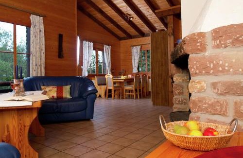 Schoenecken Ski Chalet | Cozy chalet with fireplace located in wooded area