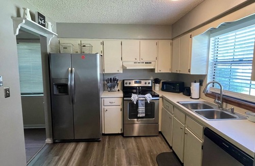 Brooksville House | Cozy Coachlight Village Getaway- Entire townhome w/private parking and yard.