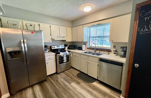 Brooksville House | Cozy Coachlight Village Getaway- Entire townhome w/private parking and yard.