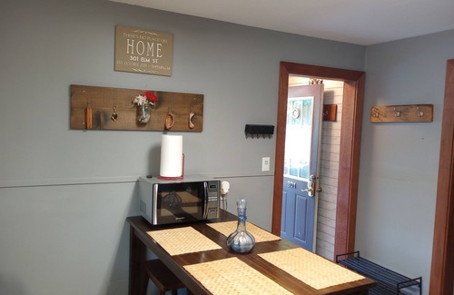 Ishpeming House | Cozy corner lot will provide a comfortable space for a couple or small family.