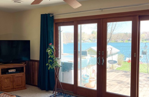 Gobles Cottage | Cozy Cottage Lakefront View - Paddle Board, Kayak, Hot Tub and more!