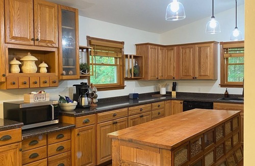 Jacksonport House | Cozy cottage tucked in the woods. 5 minutes from Cave Point and Whitefish Dunes.