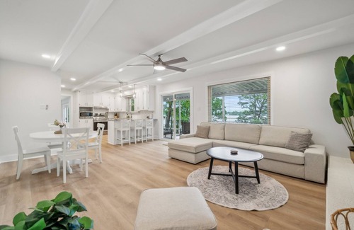 Southmont House | Cozy Cove-Lakefront home with kayaks, paddle board, lillypad, arcade, & fire pit