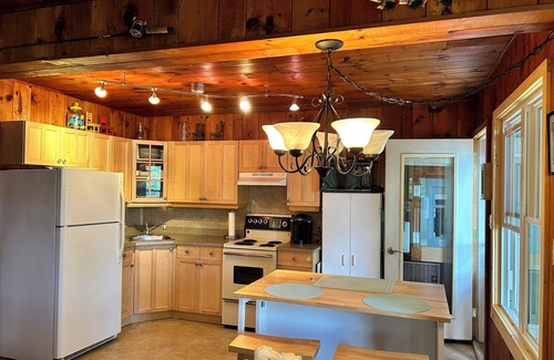 Minden Hills Cottage | Cozy Cove on Gull LakenGetaway to your own cove with swim up dock and sand beach