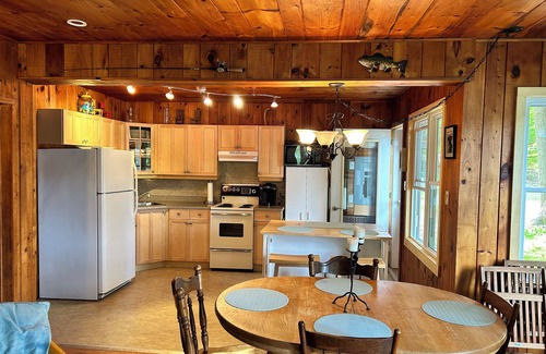 Minden Hills Cottage | Cozy Cove on Gull LakenGetaway to your own cove with swim up dock and sand beach