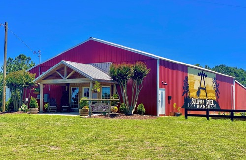 Vinemont House | Cozy cowboy retreat that feels like a western town overlooking a beautiful ranch