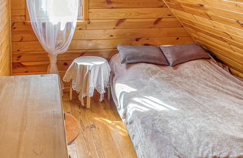 gmina Rzasnik House | Cozy, family-friendly wooden house with wood-burning stove in beautiful natural surroundings.
