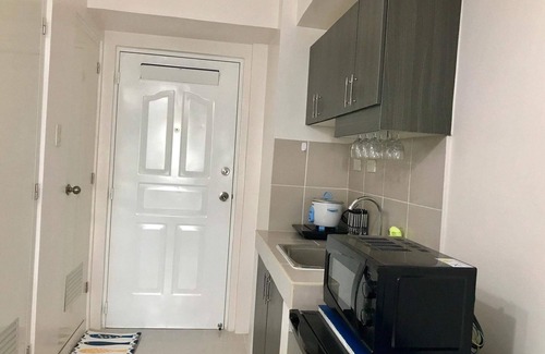 Silang Junction South Condo | Cozy Greek Chic 1BR Unit in Tagaytay - Aneto Meros