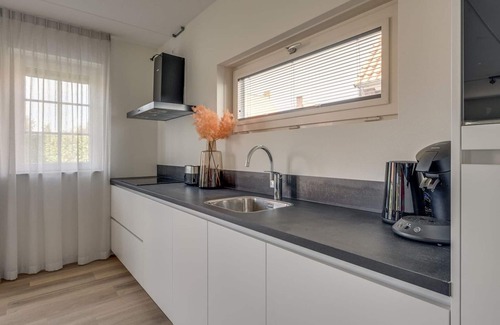 Ossenisse House | Cozy Holiday Home in a Holiday Park in Zeeland