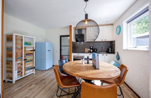 Den Burg House | Cozy holiday home in Den Burg with hot tub