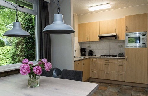 Bisselt House | Cozy house with a fireplace in a holiday park in a natural area