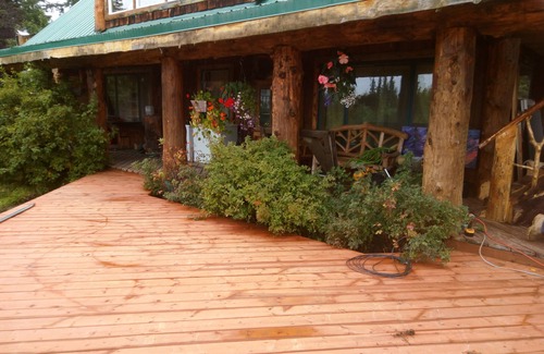 Cohoe Bed & Breakfast | Cozy hunter themed room with hot breakfast