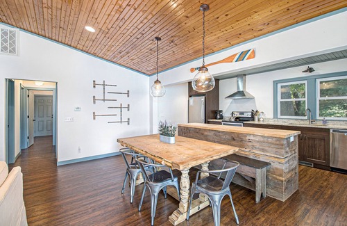 Allegan Cottage | Cozy, lakefront cabin with gas grill and wrap-around deck.