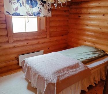 Muonio Ski Chalet | Cozy Log Cabin with Sauna and Wifi