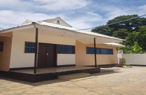 Tanga House | Cozy Master bedroom in Tanga