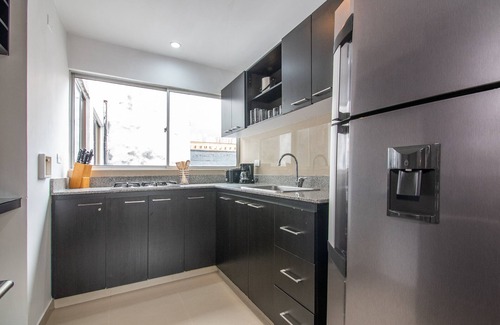 Astorga Apartment | Cozy Penthouse next to Poblado Park with Large Balcony and A/C