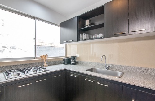 Astorga Apartment | Cozy Penthouse next to Poblado Park with Large Balcony and A/C