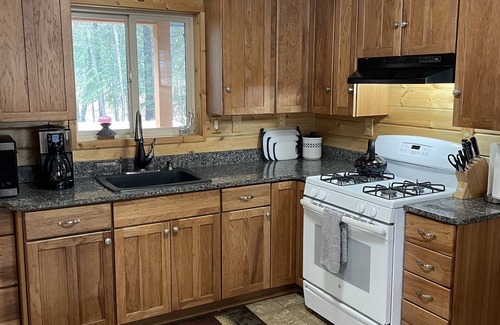 Thompson Falls House | Cozy, river front cabin in the woods just steps away from the Clark Fork.