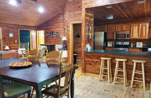 Pangburn Cabin | Cozy riverfront cabin! Great fishing & fun for the whole family.