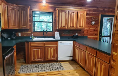 Pangburn Cabin | Cozy riverfront cabin! Great fishing & fun for the whole family.
